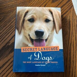 The Secret Language of Dogs by Heather Dunphy